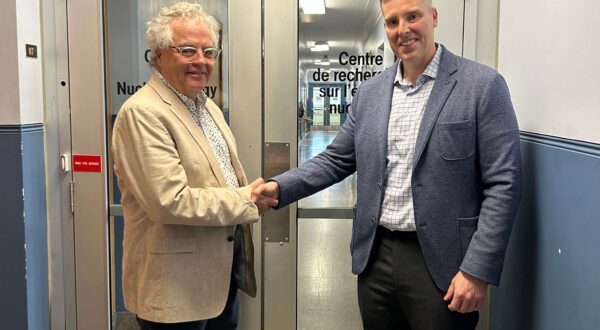 Jason Van Wart, President and CEO of Laurentis, right, joined Josh Leon, Dean of Engineering at the University of New Brunswick to present a donation to UNB's Centre for Nuclear Energy Research.