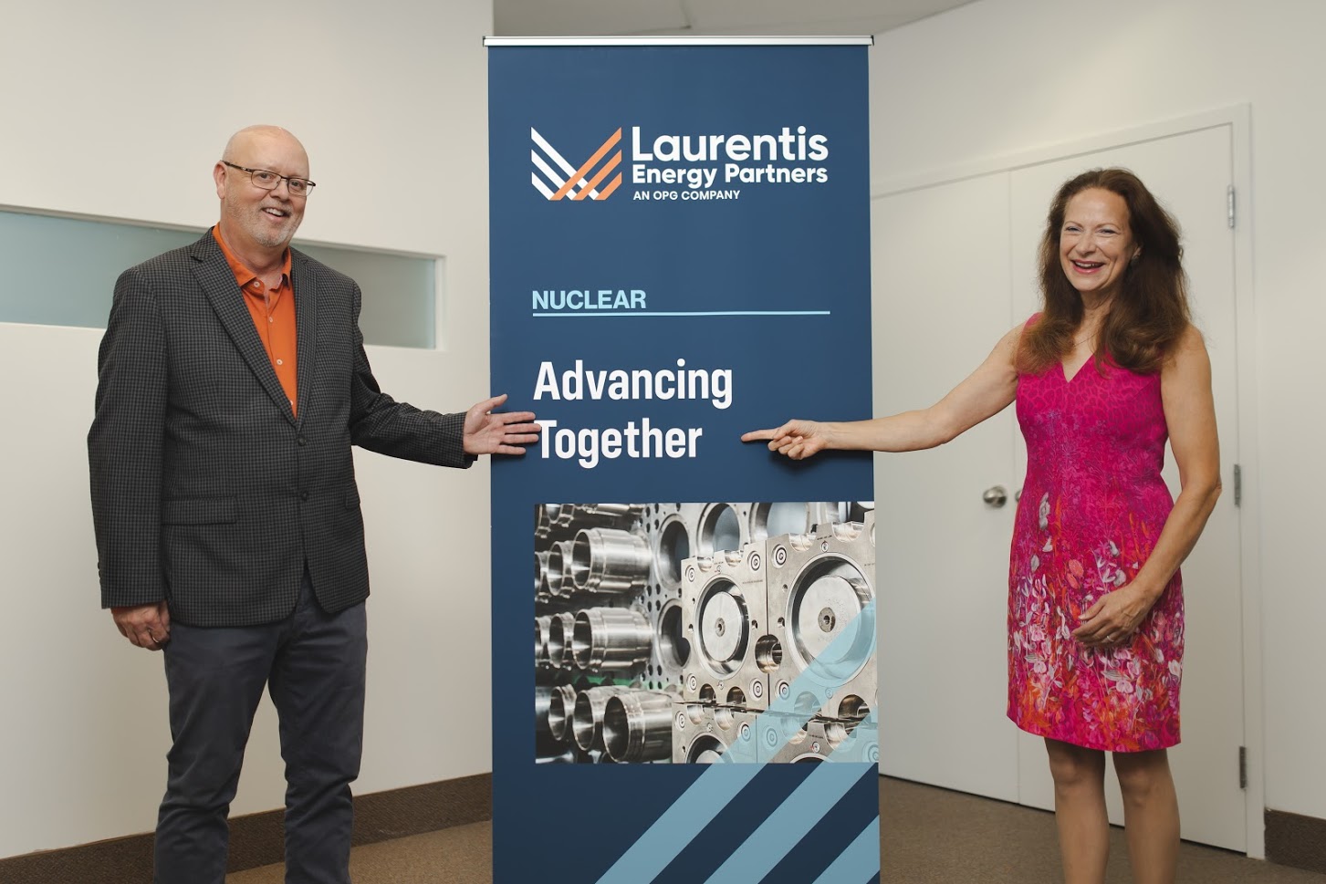Andrew Whipple, Senior Advisor at Laurentis Energy Partners (left) celebrates partnership with President of the Atlantica Centre for Energy, Colleen d'Entremont (right).